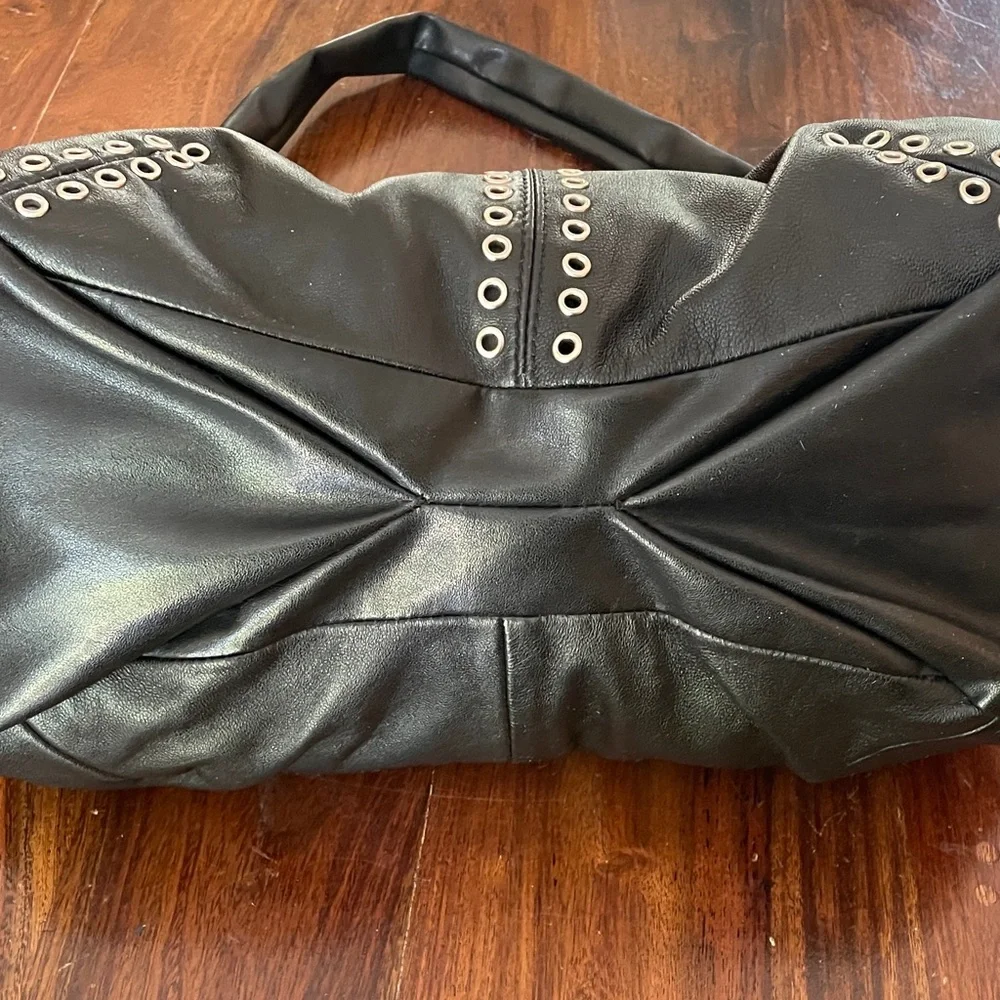 Excelled Collection Black Leather Hobo bag w/ Metal Grommets
